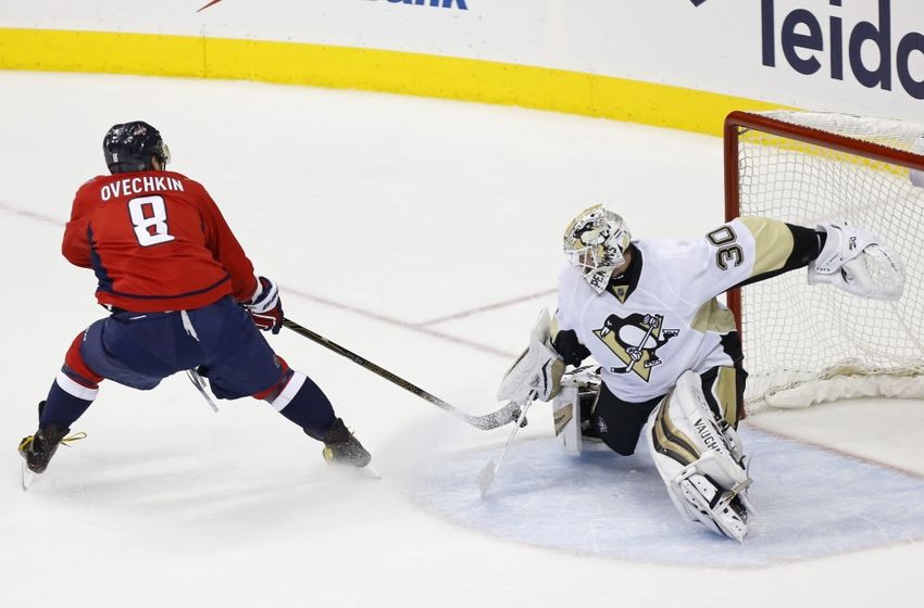 Apr 28, 2016; Washington, DC, USA; Pittsburgh Penguins goalie Matt Murray (30) makes a save on Washington Capitals left wing Alex Ovechkin (8) in the third period in game one of the second round of the 2016 Stanley Cup Playoffs at Verizon Center. Mandatory Credit: Geoff Burke-USA TODAY Sports