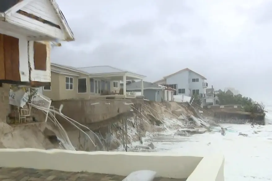 New York post-Florida homes on brink of collapse as Tropical Storm Nicole batters state  
 